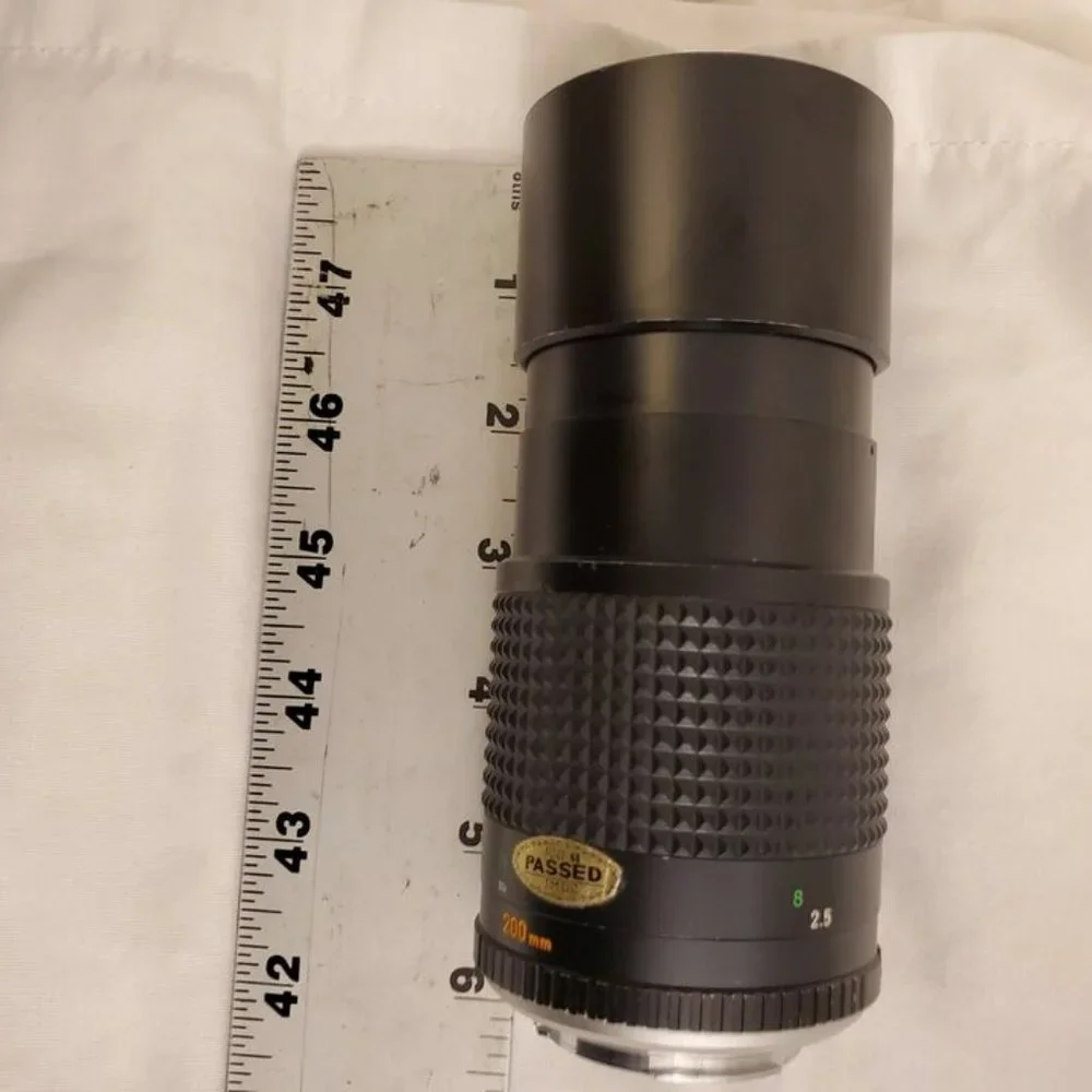 MINOLTA MC TELESCOPING ROKKOR-X 1:4 F=200MM CAMERA LENS 1013688